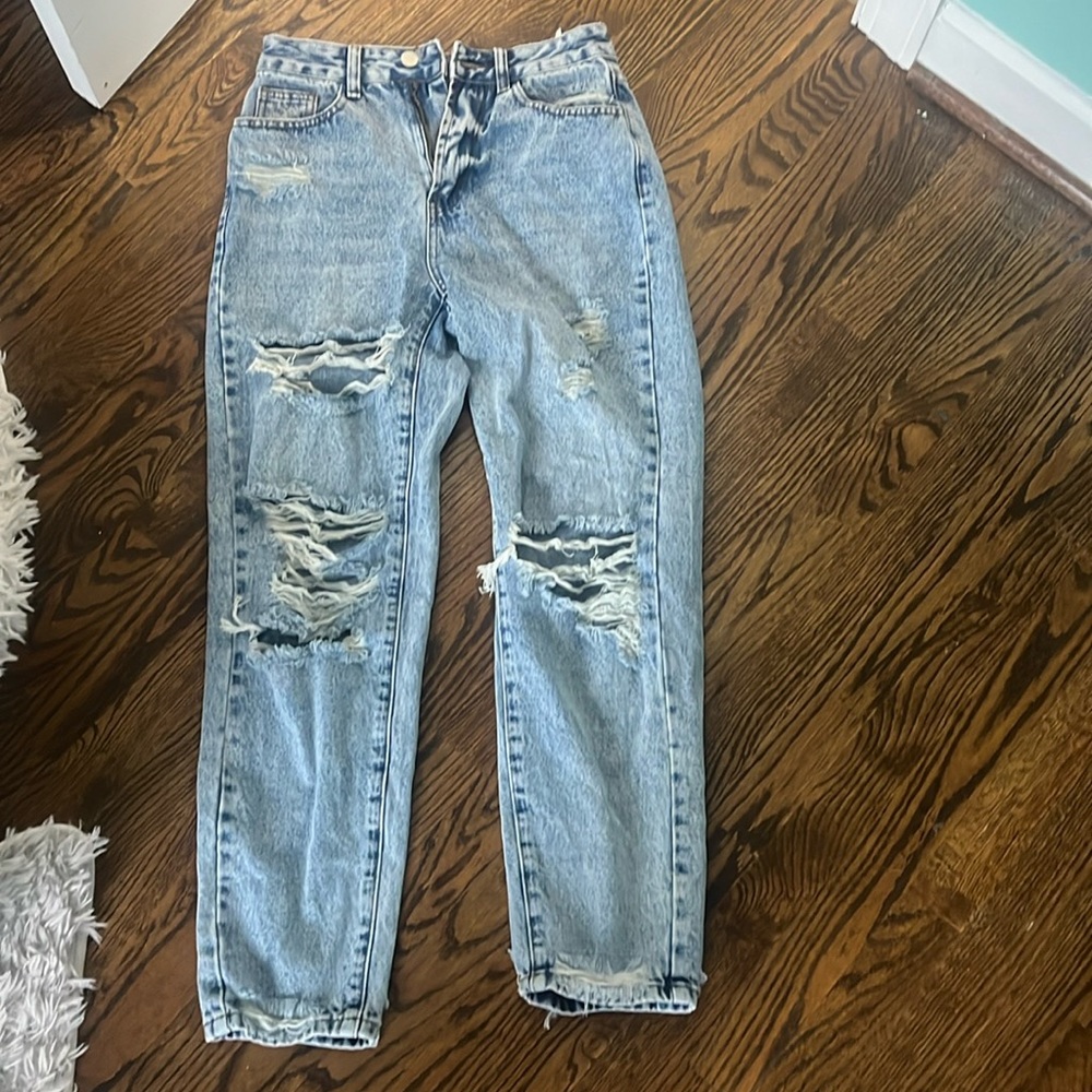 blue faded ripped mom jeans